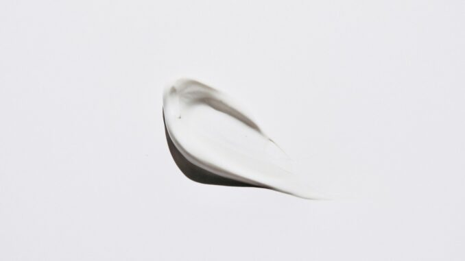 stainless steel spoon on white surface